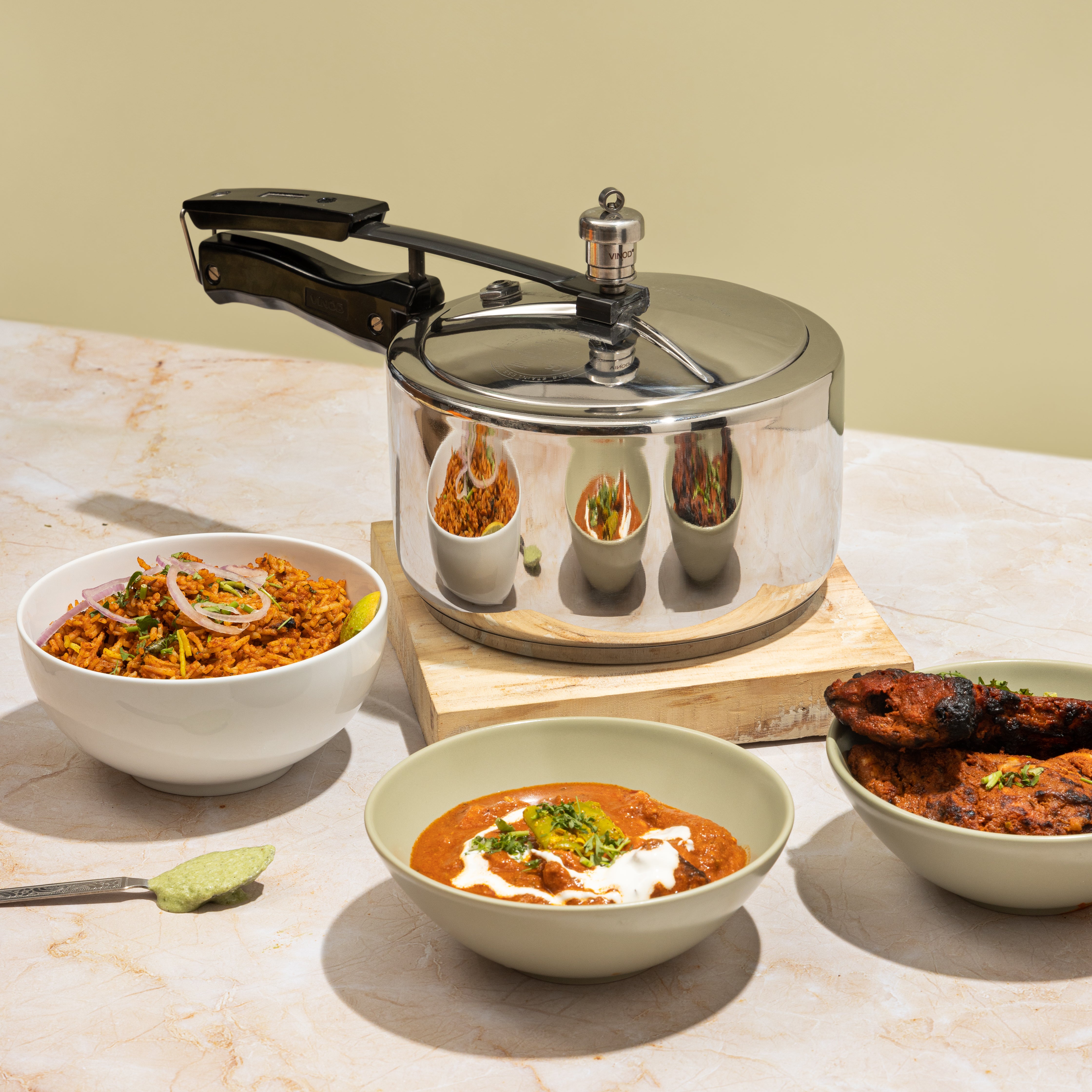 Vinod 18/8 Stainless Steel Inner Lid Pressure Cooker