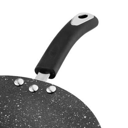 Close-up of the Marlibo Nonstick Concave Tawa showing a sturdy riveted handle and durable nonstick cooking surface.