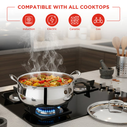 Stainless steel pot on a gas stove with food cooking, surrounded by kitchen utensils.