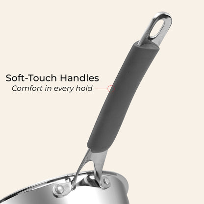 Stainless steel pot with soft-touch handle on a beige background