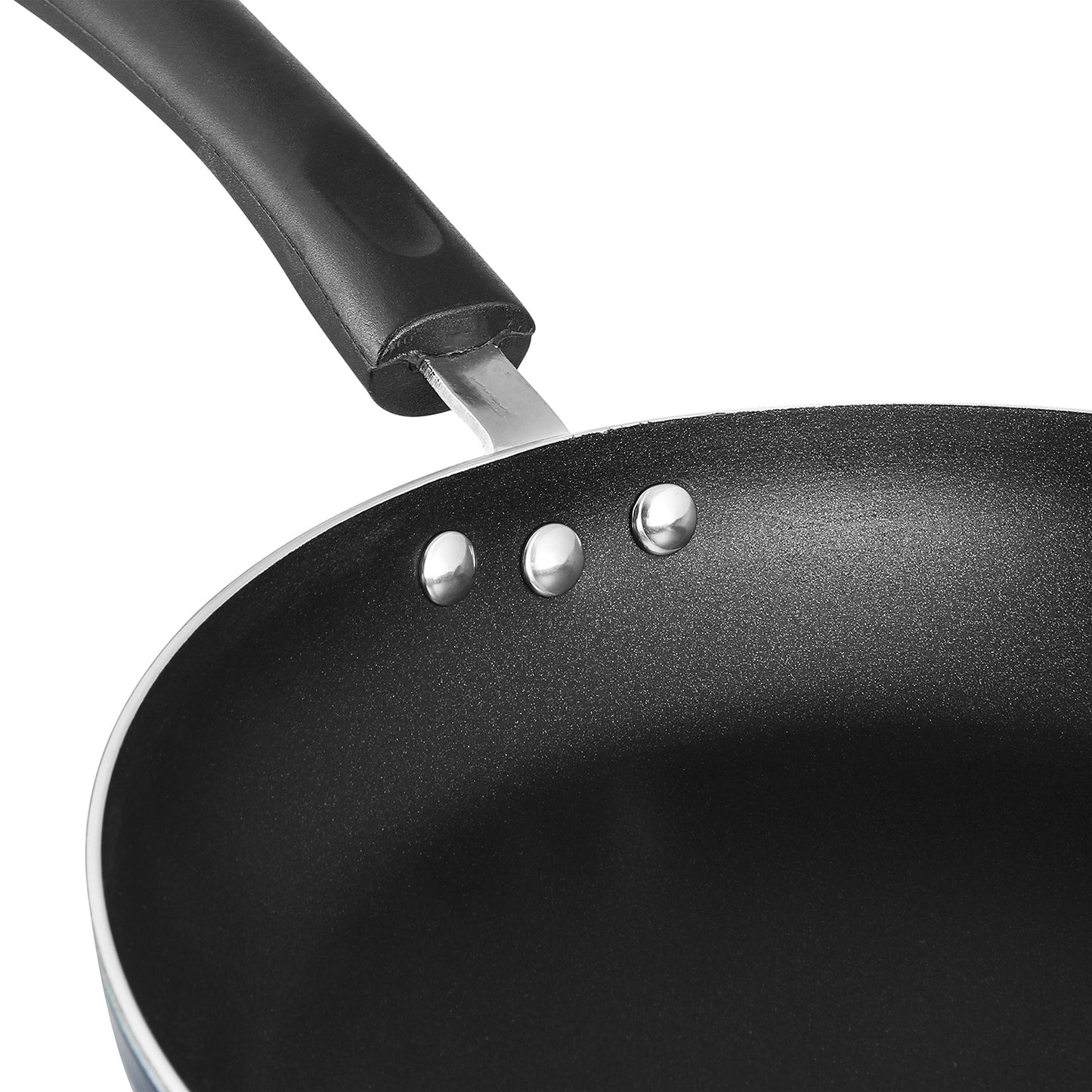 Close-up of a nonstick frying pan interior with a sturdy riveted handle and durable coating for everyday cooking.