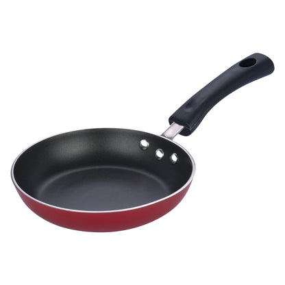 Red nonstick frying pan with a flat base and black ergonomic handle, ideal for everyday frying and sautéing.
