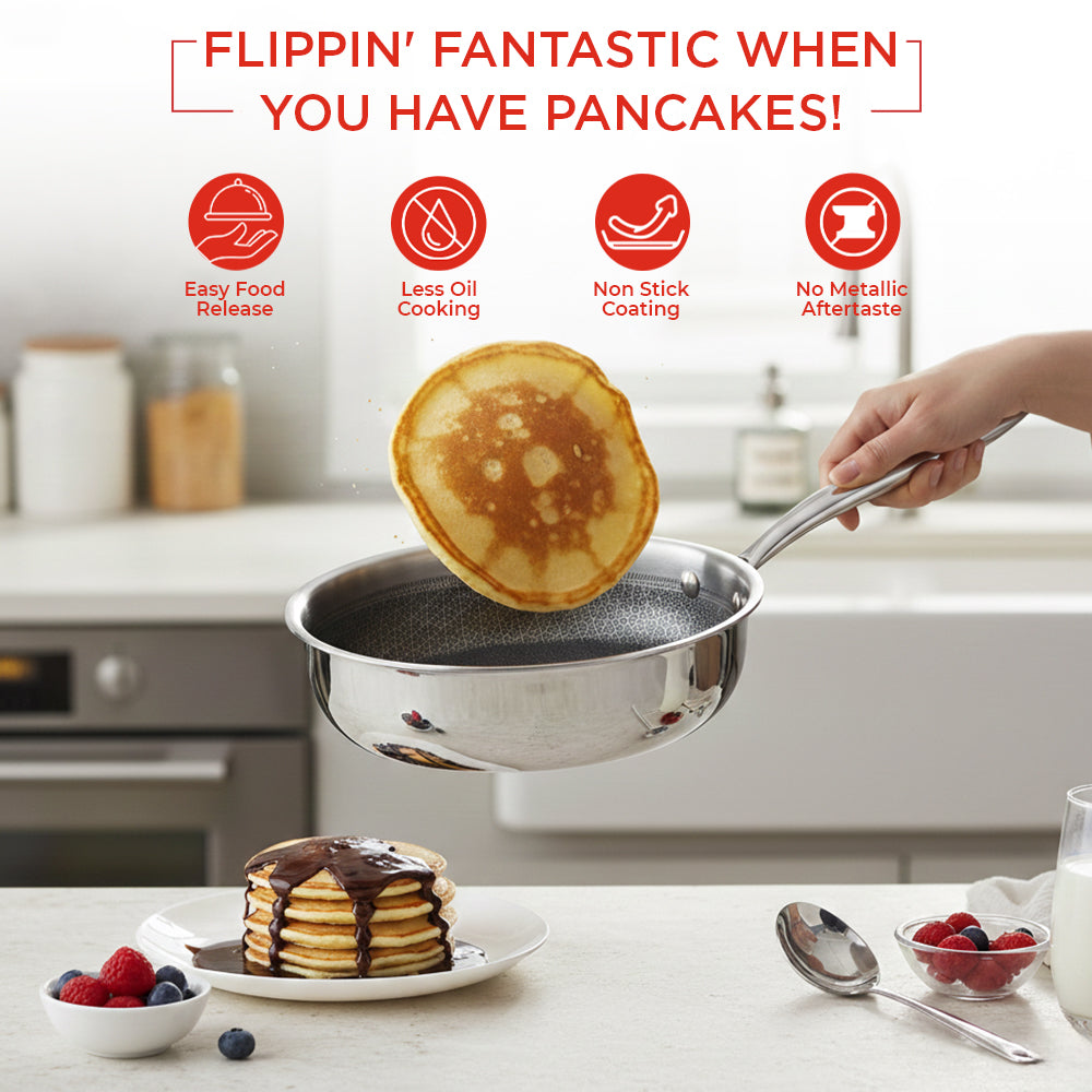 Person lifting a pancake from a non-stick frying pan with kitchen background